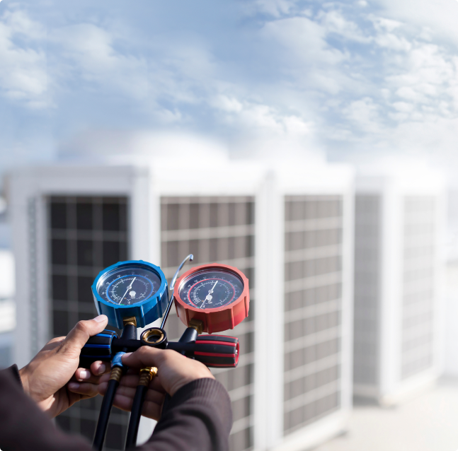 HVAC technician servicing rooftop units